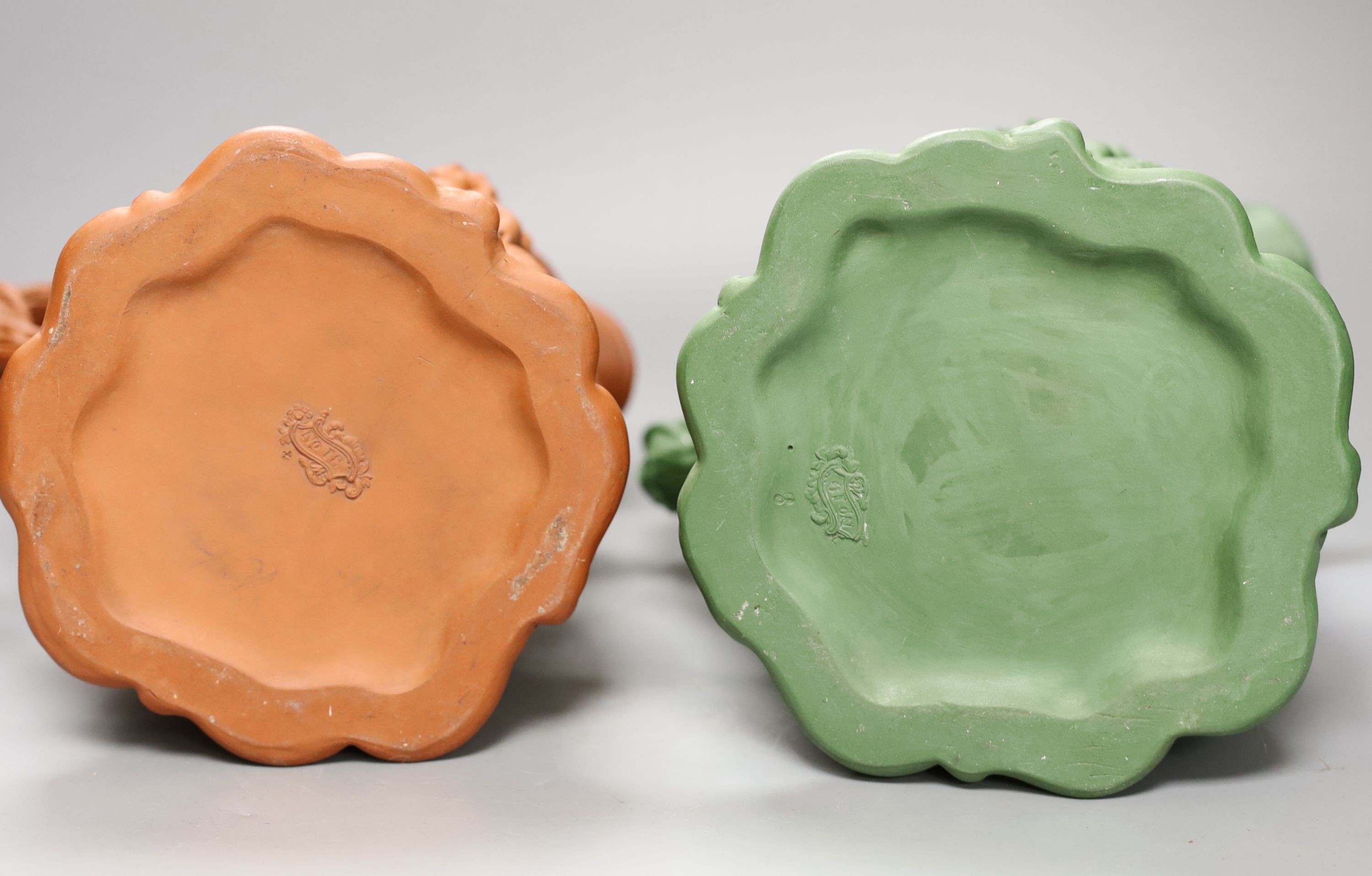 Two early 19th century terracotta Bacchanalian jugs, one green glazed 28cm